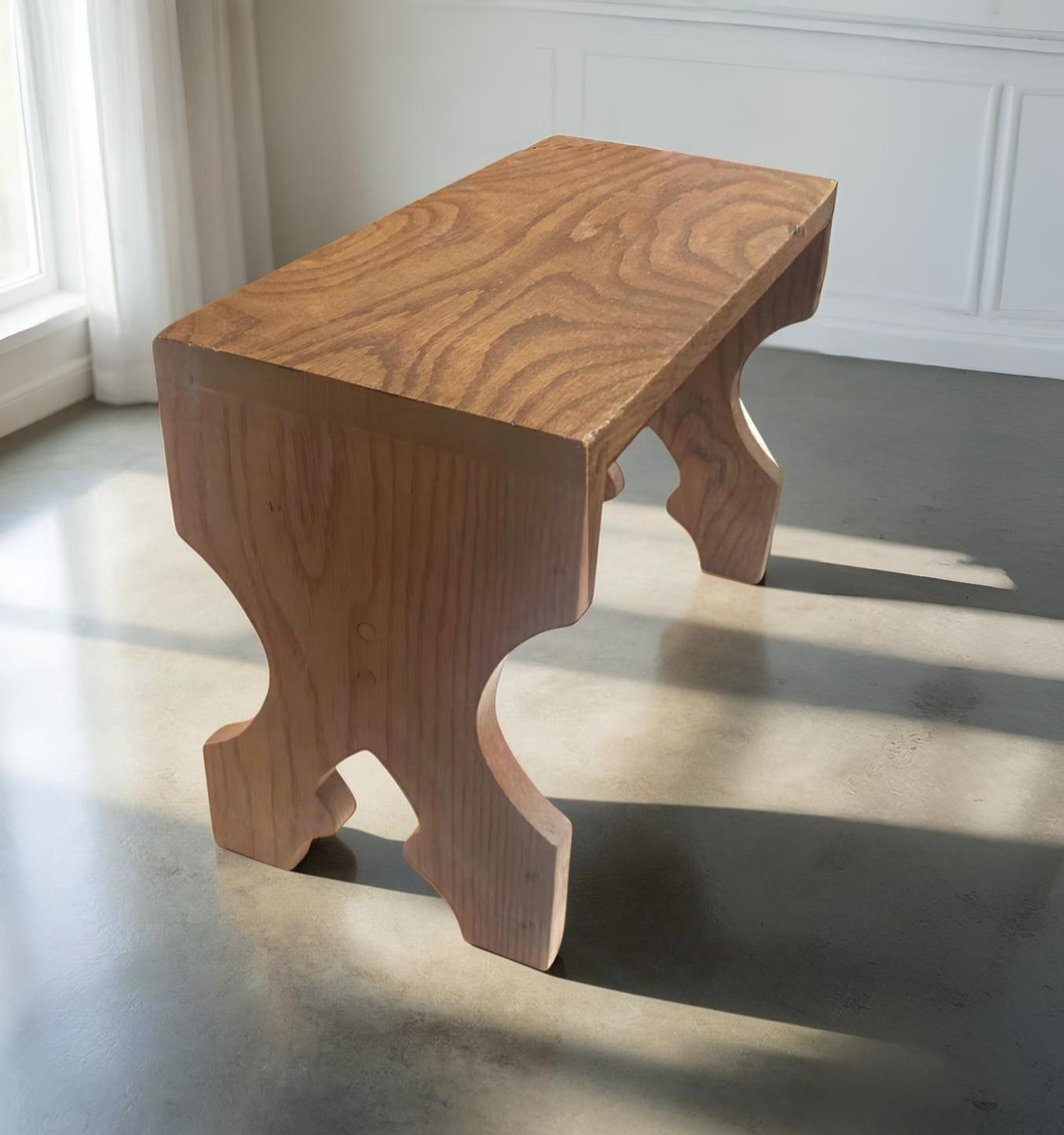 The Sturdy Step Stool, handcrafted in warm-toned wood